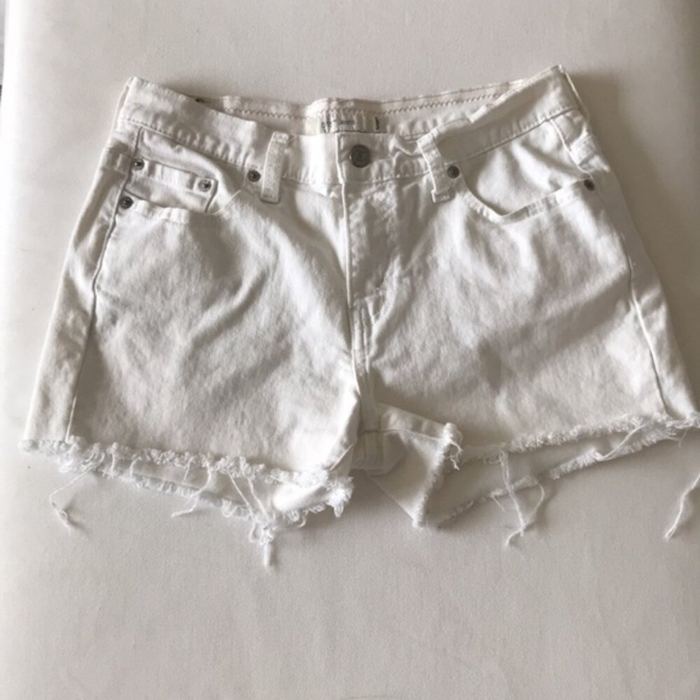 Levi’s cut-off white jean shorts